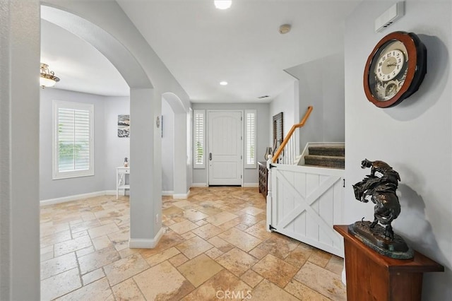 29160 Harmony Way, Saugus, CA 91390 - foyer entrance featuring arched walkways, stone tile floors, plenty of natural light, and recessed lighting