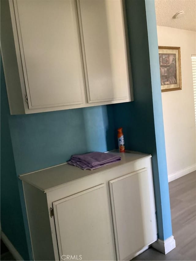 13489 Buggy Whip Ct, Victorville, CA 92392 - detailed view of a textured ceiling and wood finished floors