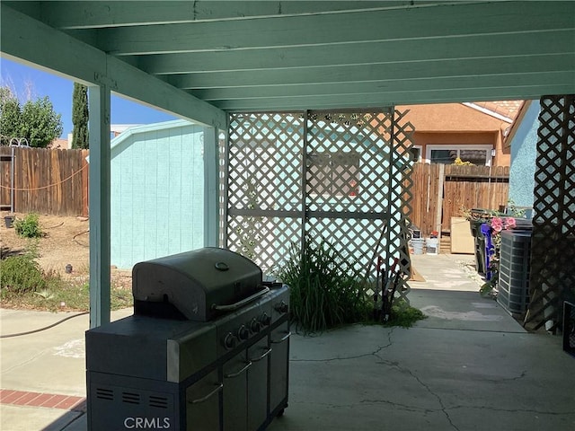 13489 Buggy Whip Ct, Victorville, CA 92392 - view of patio with area for grilling and a storage unit