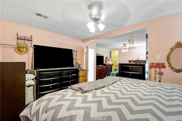 20290 E Arrow Unit C, Covina, CA 91724 - bedroom with a textured ceiling and ceiling fan