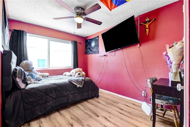 20290 E Arrow Unit C, Covina, CA 91724 - bedroom with light wood-style flooring, a textured ceiling, and a ceiling fan