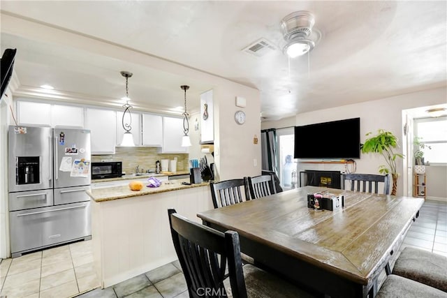 20290 E Arrow Unit C, Covina, CA 91724 - dining room with light tile patterned floors, plenty of natural light, and ceiling fan