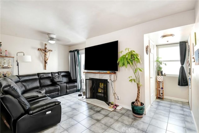 20290 E Arrow Unit C, Covina, CA 91724 - living area featuring a high end fireplace, ceiling fan, and tile patterned flooring