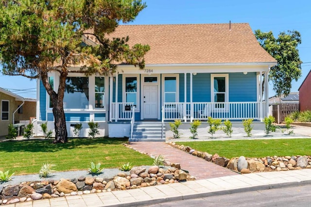 7284 W Point Ave, La Mesa, CA 91942 - view of front of house with a front lawn, a porch, and a shingled roof