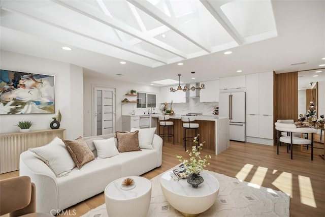 3253 San Amadeo Unit P, Laguna Woods, CA 92637 - living area with light wood finished floors and recessed lighting