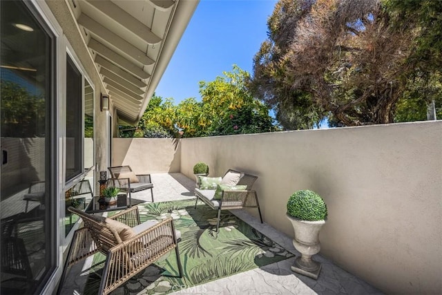 3253 San Amadeo Unit P, Laguna Woods, CA 92637 - balcony featuring outdoor lounge area