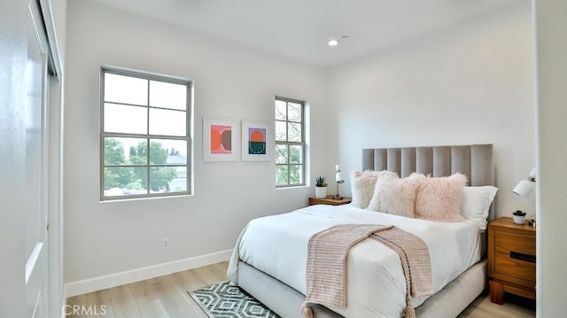 17413 Siena Ln, Fountain Valley, CA 92708 - bedroom with light wood-style flooring and recessed lighting