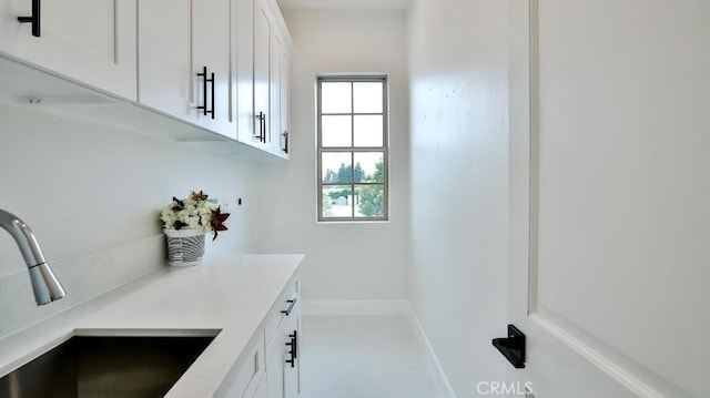 17413 Siena Ln, Fountain Valley, CA 92708 - interior space featuring white cabinets and light countertops