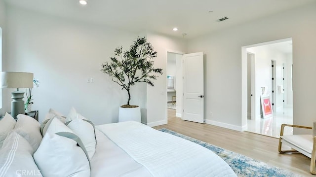 17413 Siena Ln, Fountain Valley, CA 92708 - bedroom with wood finished floors and recessed lighting