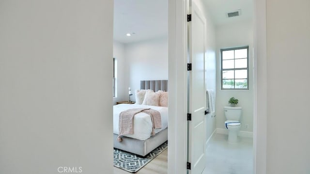 17413 Siena Ln, Fountain Valley, CA 92708 - bedroom with baseboards and ensuite bathroom