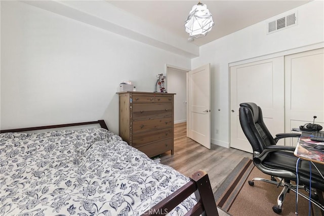 9044 Garvey Ave Unit 21, Rosemead, CA 91770 - bedroom with light wood-style floors, a closet, and an office area