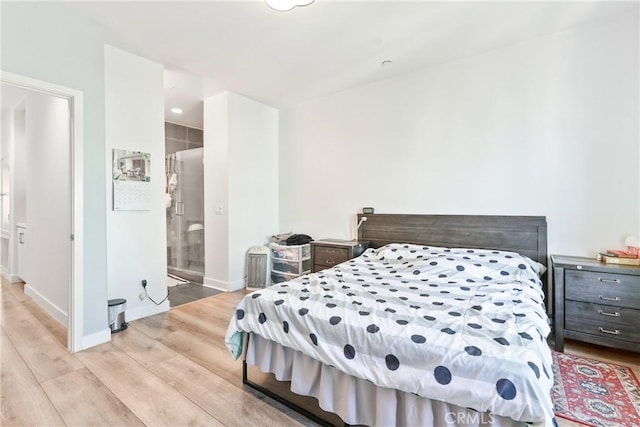 9044 Garvey Ave Unit 21, Rosemead, CA 91770 - bedroom with light wood-type flooring and baseboards