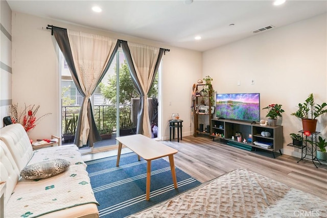9044 Garvey Ave Unit 21, Rosemead, CA 91770 - living room featuring wood finished floors and recessed lighting