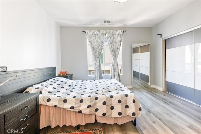 9044 Garvey Ave Unit 21, Rosemead, CA 91770 - bedroom with light wood-style flooring and baseboards