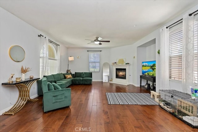 10349 Cooks Dr Unit 2, Rancho Cucamonga, CA 91730 - living room with wood-type flooring, ceiling fan, and a glass covered fireplace