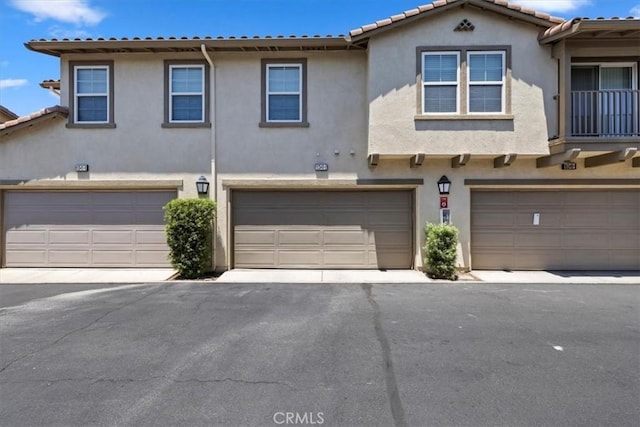 10349 Cooks Dr Unit 2, Rancho Cucamonga, CA 91730 - townhome / multi-family property with stucco siding and a garage