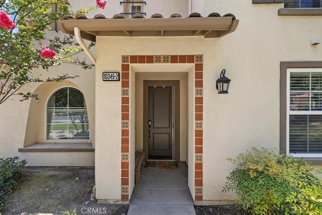 10349 Cooks Dr Unit 2, Rancho Cucamonga, CA 91730 - view of exterior entry with stucco siding
