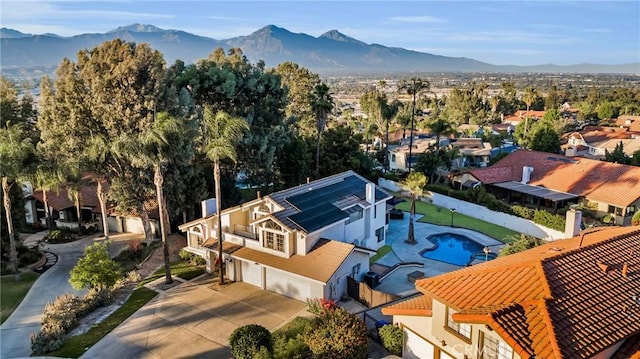 1549 Hillcrest Dr, Pomona, CA 91768 - aerial perspective of suburban area with mountains and a pool