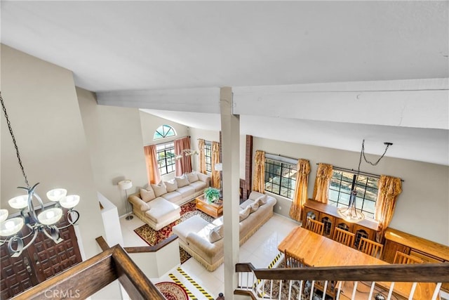 1549 Hillcrest Dr, Pomona, CA 91768 - living room featuring a chandelier, vaulted ceiling, plenty of natural light, and tile patterned floors