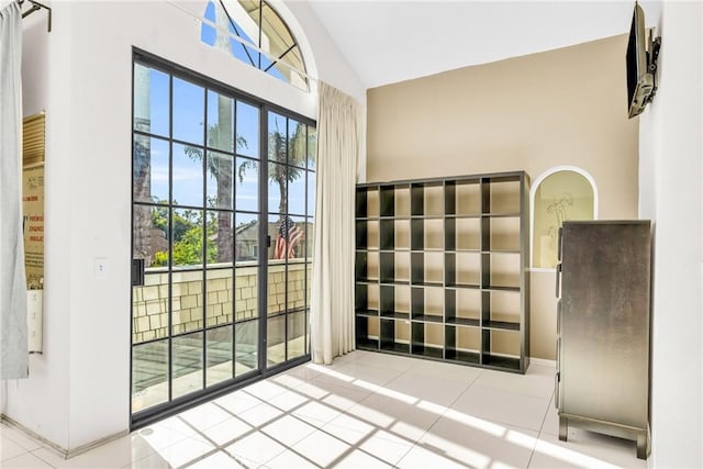 1549 Hillcrest Dr, Pomona, CA 91768 - doorway to outside featuring tile patterned floors and high vaulted ceiling