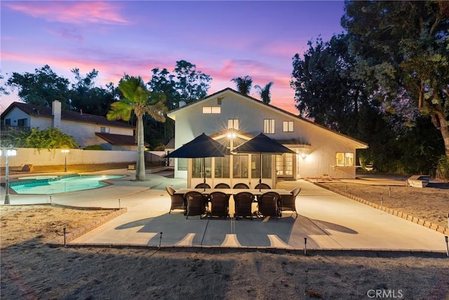 1549 Hillcrest Dr, Pomona, CA 91768 - rear view of property featuring a patio area, french doors, and an outdoor pool