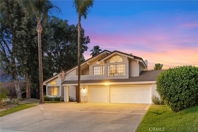 1549 Hillcrest Dr, Pomona, CA 91768 - view of front of property featuring concrete driveway and a garage