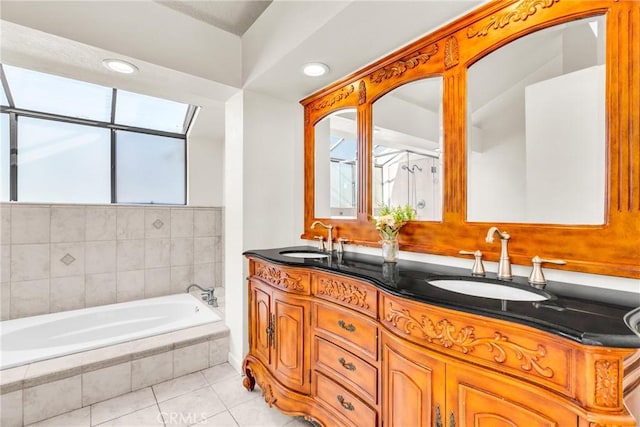 1549 Hillcrest Dr, Pomona, CA 91768 - bathroom featuring double vanity, a garden tub, tile patterned flooring, and recessed lighting