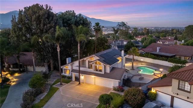 1549 Hillcrest Dr, Pomona, CA 91768 - aerial view of property and surrounding area featuring a mountain backdrop