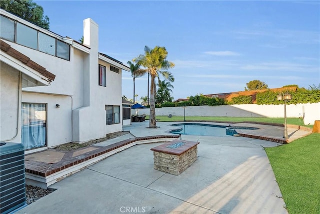 1549 Hillcrest Dr, Pomona, CA 91768 - view of swimming pool featuring a patio, a fenced backyard, an outdoor fire pit, and a hot tub