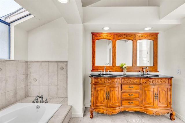 1549 Hillcrest Dr, Pomona, CA 91768 - full bath featuring double vanity, a garden tub, and tile patterned floors