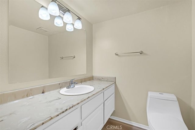 675 S College Ave, Claremont, CA 91711 - bathroom with vanity and wood finished floors