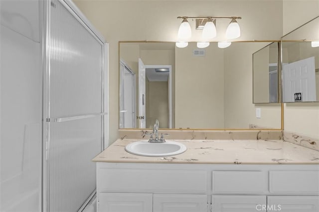 675 S College Ave, Claremont, CA 91711 - bathroom with vanity and an enclosed shower
