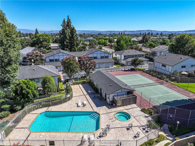 675 S College Ave, Claremont, CA 91711 - aerial perspective of suburban area featuring a pool area and mountains