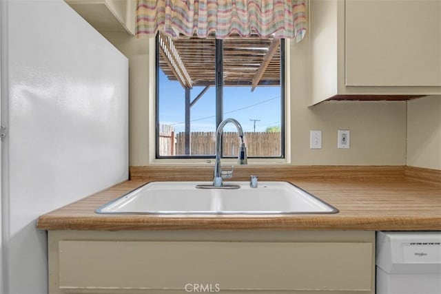 675 S College Ave, Claremont, CA 91711 - kitchen featuring dishwasher and light countertops