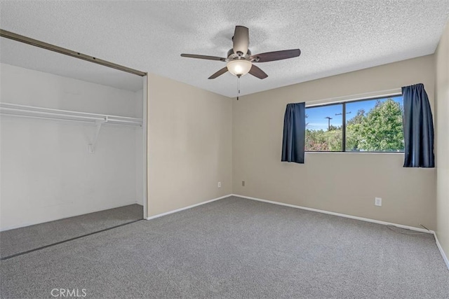 675 S College Ave, Claremont, CA 91711 - unfurnished bedroom featuring carpet floors, a textured ceiling, a closet, and a ceiling fan
