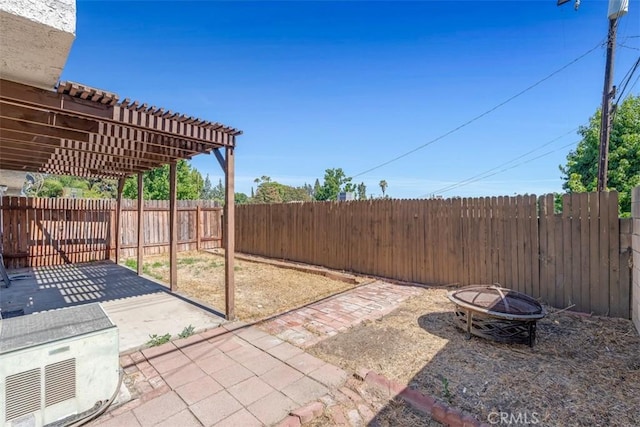 675 S College Ave, Claremont, CA 91711 - fenced backyard with an outdoor fire pit, a patio, and a pergola