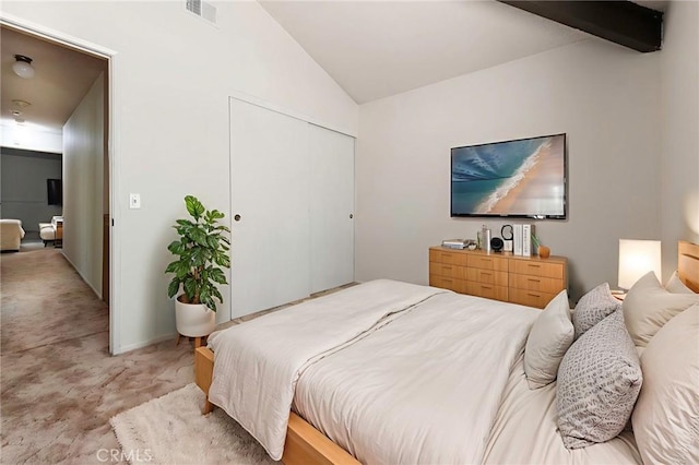 6157 Hillary Ct, Riverside, CA 92506 - bedroom with light colored carpet, lofted ceiling, and a closet