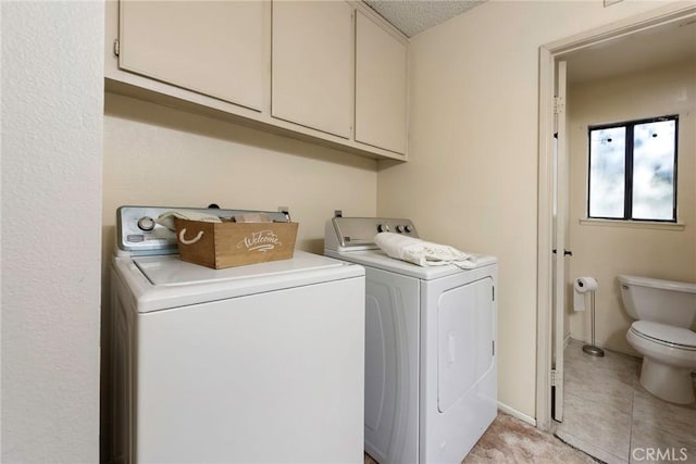 6157 Hillary Ct, Riverside, CA 92506 - washroom featuring separate washer and dryer and baseboards