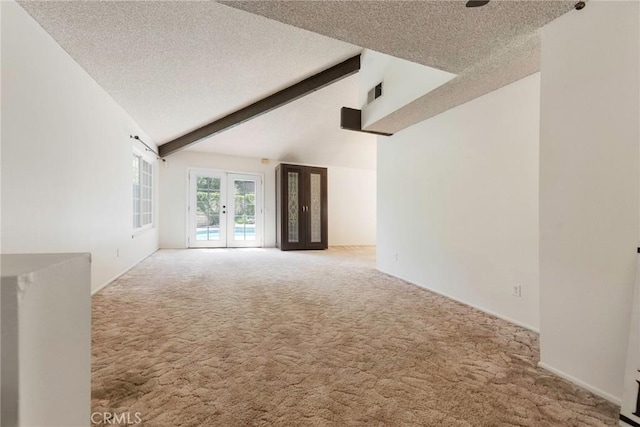 6157 Hillary Ct, Riverside, CA 92506 - unfurnished living room featuring carpet floors, french doors, and a textured ceiling