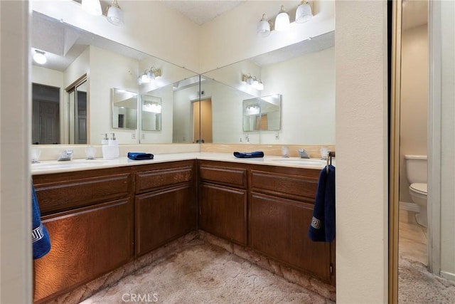 6157 Hillary Ct, Riverside, CA 92506 - bathroom with toilet and double vanity