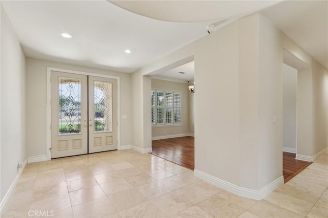 16860 Rayen St, Northridge, CA 91343 - foyer entrance with light tile patterned floors, recessed lighting, french doors, and a chandelier
