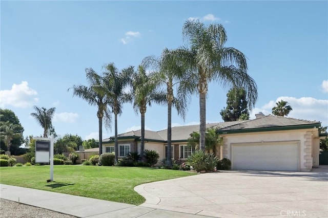 16860 Rayen St, Northridge, CA 91343 - single story home featuring a garage, driveway, a front yard, and stucco siding