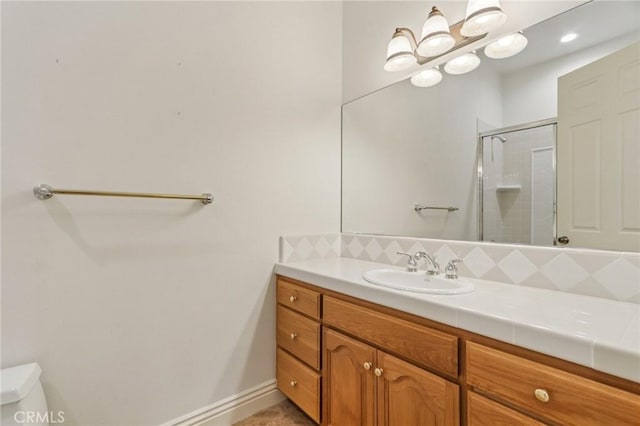 16860 Rayen St, Northridge, CA 91343 - full bathroom featuring tasteful backsplash, a shower stall, and vanity