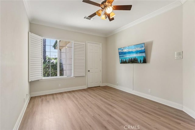 16860 Rayen St, Northridge, CA 91343 - spare room featuring wood finished floors, ornamental molding, and a ceiling fan