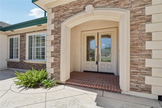 16860 Rayen St, Northridge, CA 91343 - view of exterior entry with french doors and stone siding