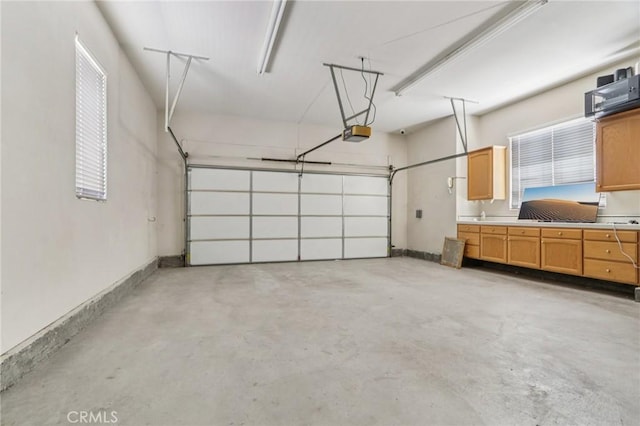 16860 Rayen St, Northridge, CA 91343 - garage featuring a garage door opener