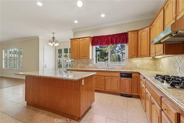 16860 Rayen St, Northridge, CA 91343 - kitchen featuring stainless steel gas cooktop, a kitchen island, under cabinet range hood, a chandelier, and light stone countertops