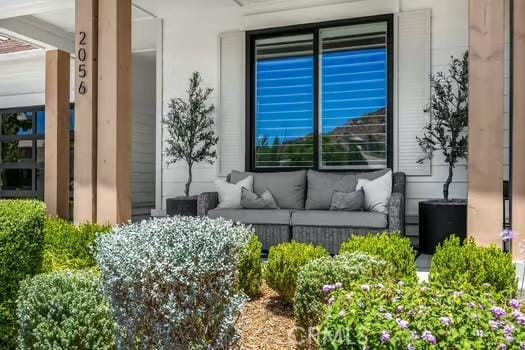 2056 Caltha Way, Perris, CA 92571 - entrance to property with an outdoor hangout area and stucco siding