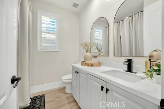 2056 Caltha Way, Perris, CA 92571 - full bath featuring vanity and wood finished floors