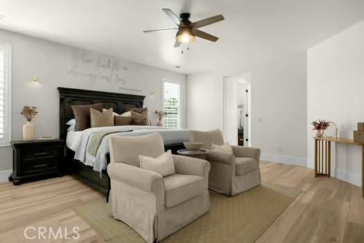 2056 Caltha Way, Perris, CA 92571 - bedroom featuring light wood-style flooring and a ceiling fan